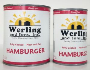Two cans of Werling & Sons cooked ground hamburger meat.